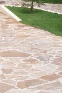 Crazy paving pattern showcasing unique garden paving service by Ariyania Landscapes in a Sydney garden.