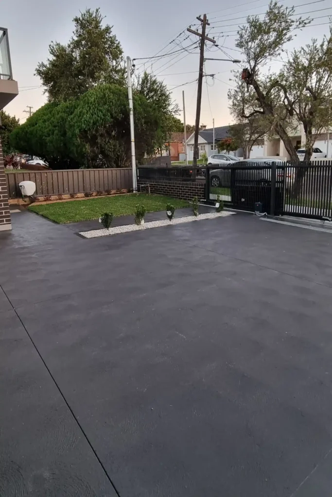 Quality concrete driveway solutions in a Sydney backyard.