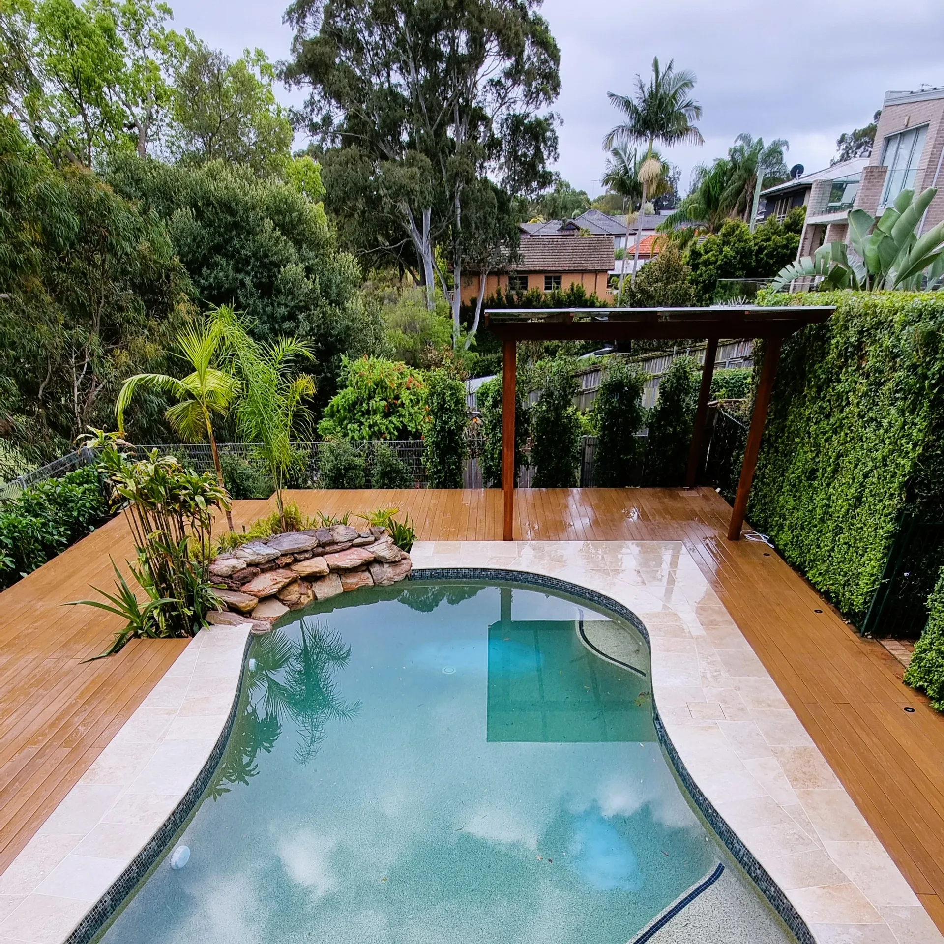 Landscaping Cost in Sydney with a modern pool and timber decking, designed by Arianya, perfect for the 2025 cost guide.