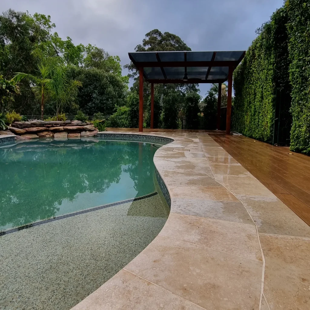 Landscaping Cost in Sydney with a stylish pool, timber decking, and pergola, designed by Arianya, perfect for the 2025 cost guide.
