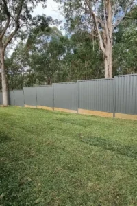 Completed fence installation in a residential backyard